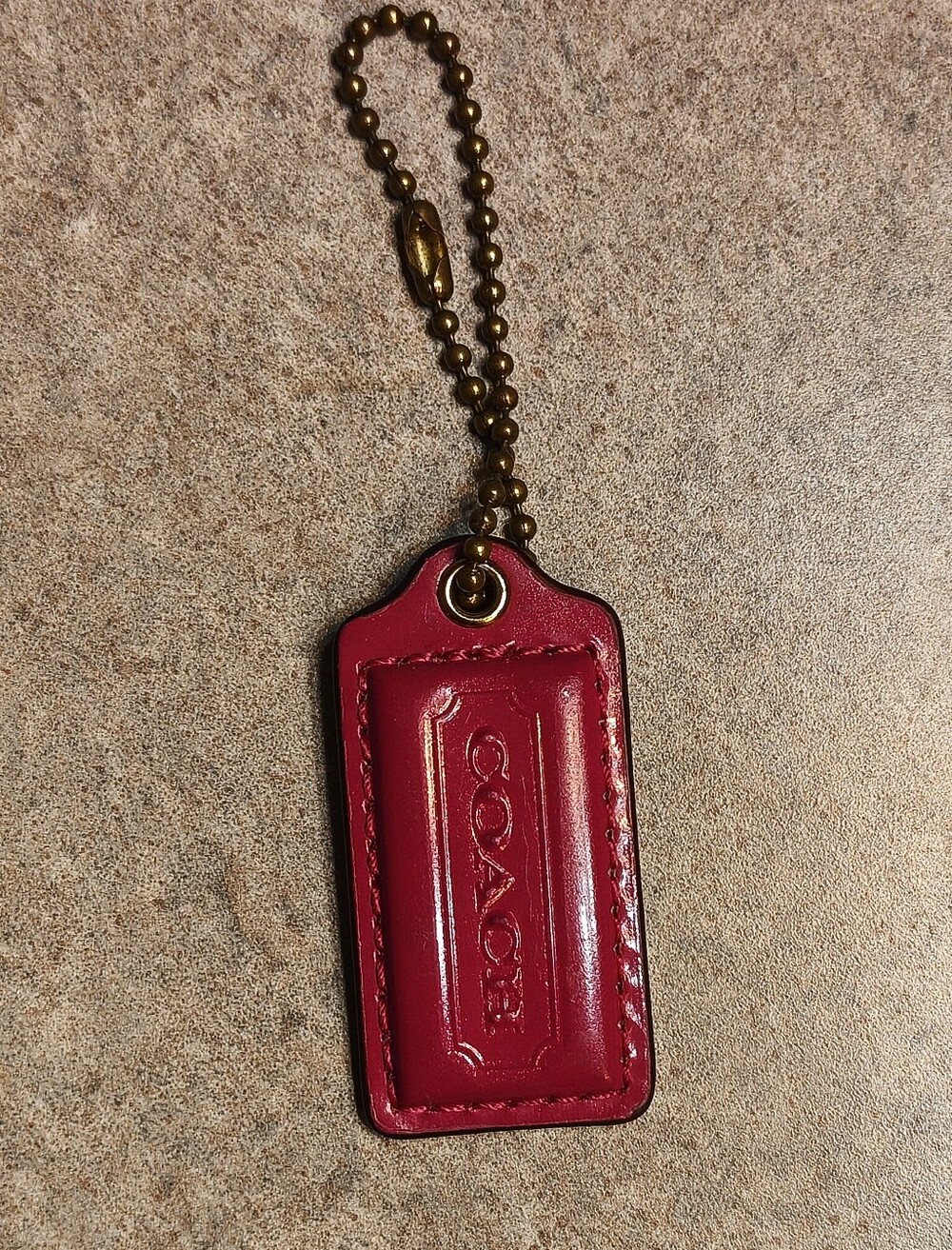 #298 COACH Fuschia Hang Tag with Brass Chain